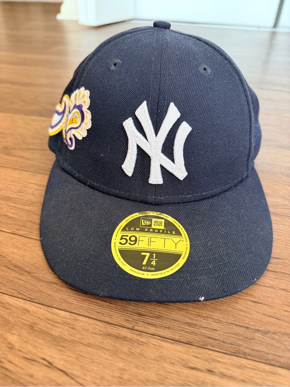 New Era Kids Navy Cap with White NY Logo and Purple/Yellow Patch